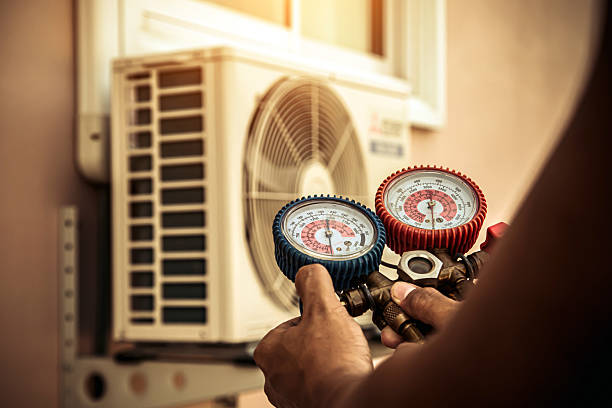 Professional Ac Installation technician working in Fort Bragg, NC
